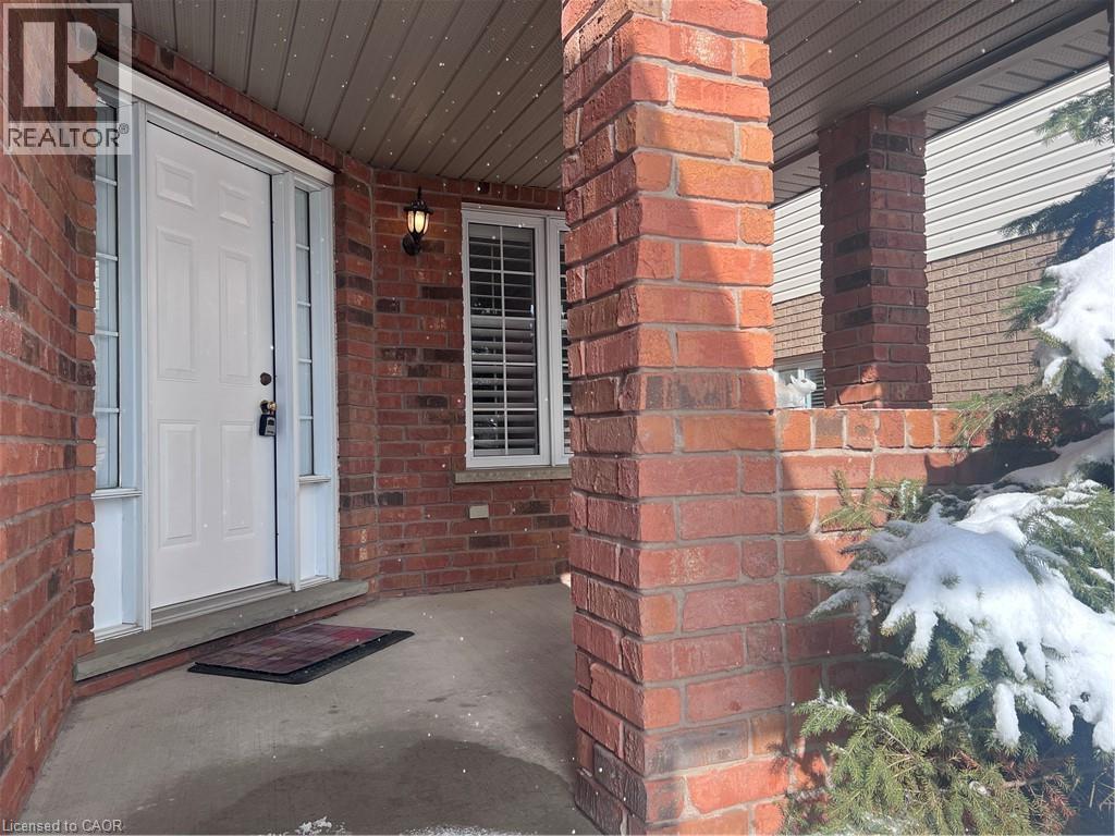 Inviting Front Porch - 242 Doon Mills Drive, Kitchener, ON - Outdoor With Exterior