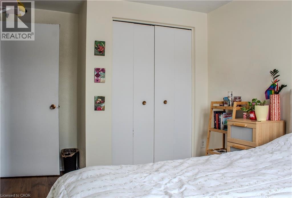 Bedroom featuring a closet and wood finished floors - 48 Riverdale Drive Unit# 2, Hamilton, ON - Indoor Photo Showing Bedroom