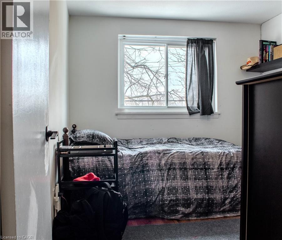 Bedroom with wood finished floors - 48 Riverdale Drive Unit# 2, Hamilton, ON - Indoor Photo Showing Bedroom