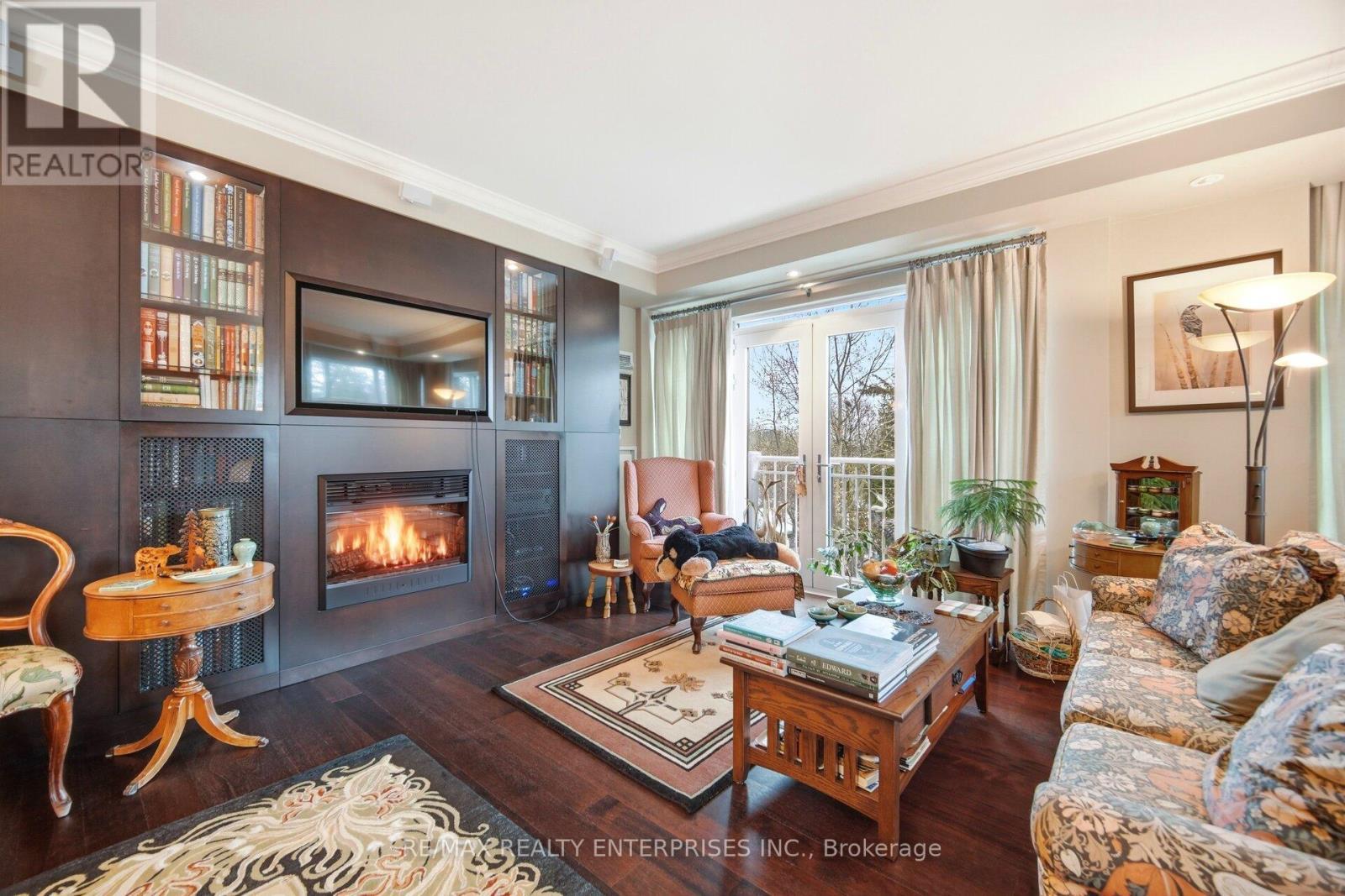 Great Room with South and West Views - 513 - 2855 Bloor Street W, Toronto, ON - Indoor Photo Showing Living Room With Fireplace