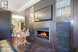 Electric Fireplace and Built in Cabinetry -