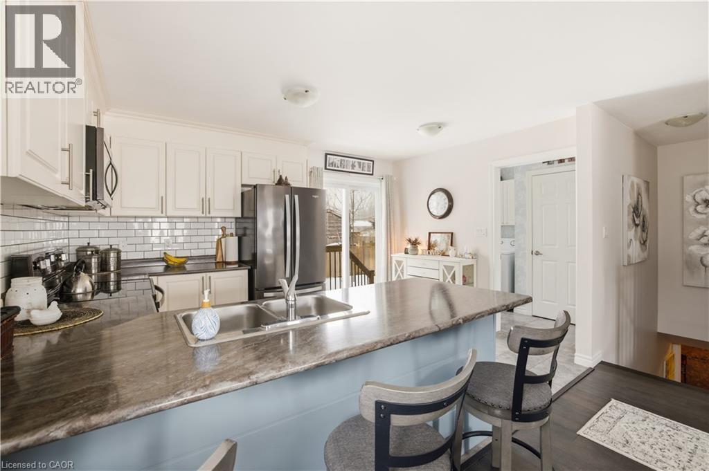15 Irving Drive, Norwich, ON - Indoor Photo Showing Kitchen With Double Sink