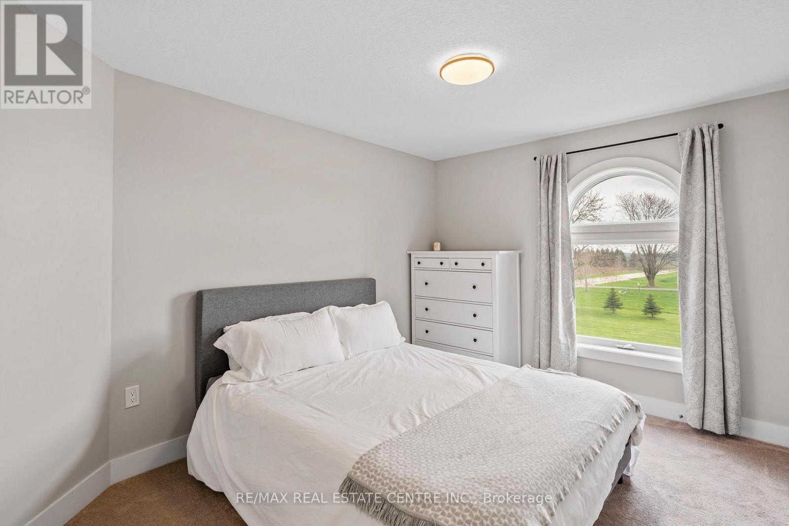 21575 Heritage Road, Thames Centre, ON - Indoor Photo Showing Bedroom