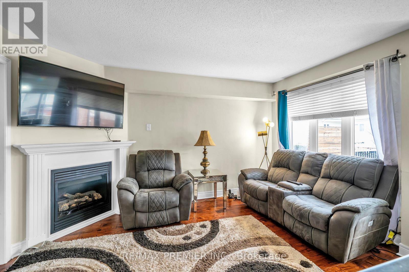 164 Dewell Crescent, Clarington, ON - Indoor Photo Showing Living Room With Fireplace