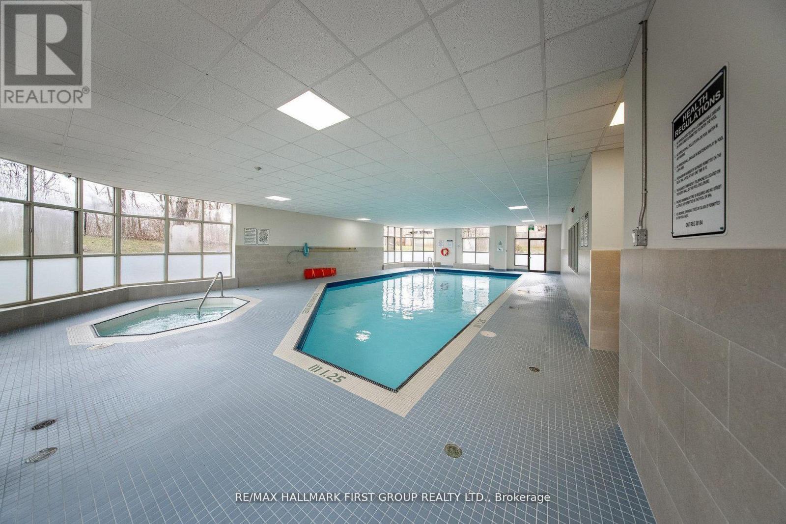 218 - 8351 Mclaughlin Road S, Brampton, ON - Indoor Photo Showing Other Room With In Ground Pool