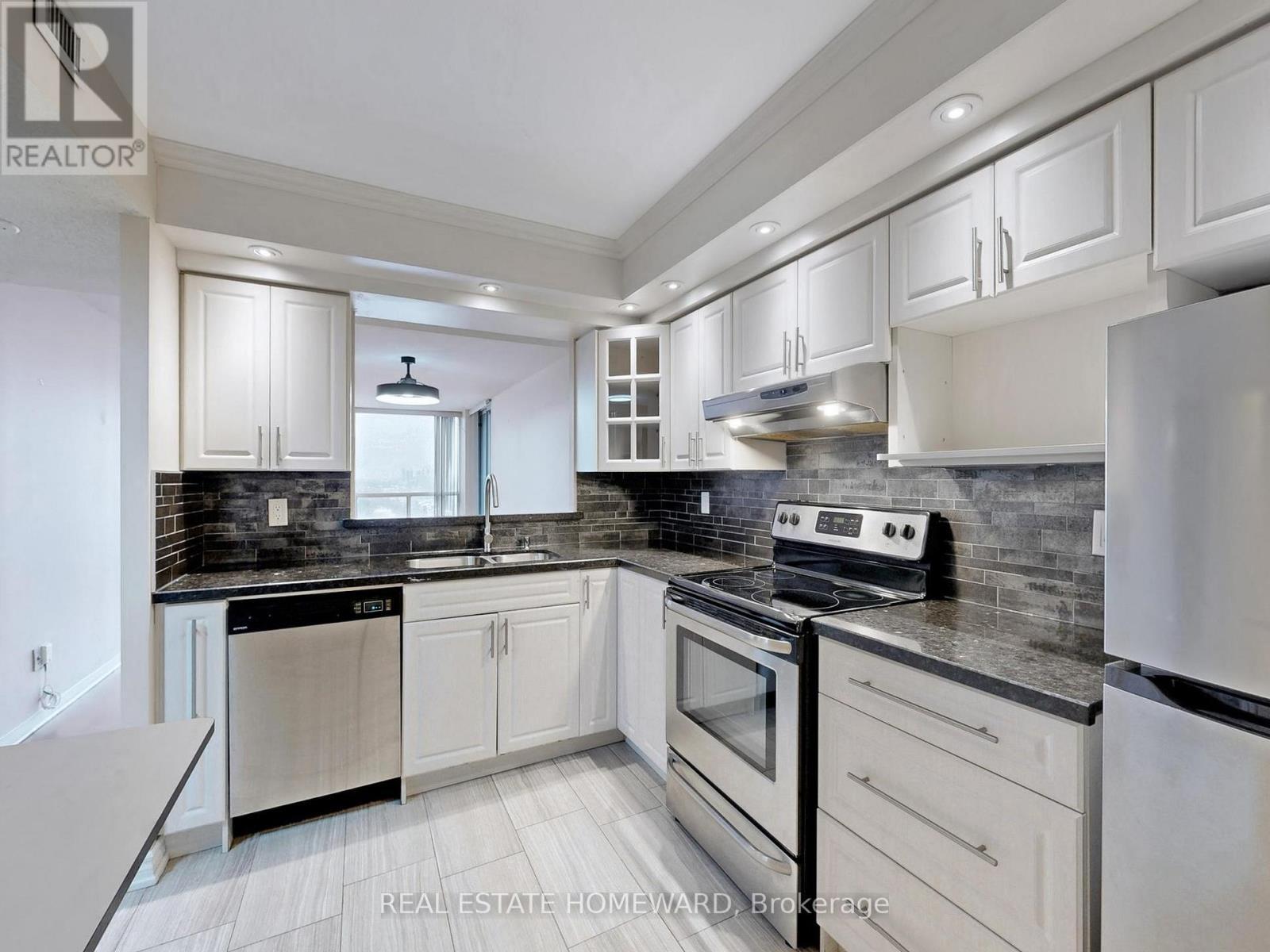 Updated Kitchen with Granite Countertops - 1116 - 4725 Sheppard Avenue E, Toronto, ON - Indoor Photo Showing Kitchen With Stainless Steel Kitchen With Double Sink With Upgraded Kitchen