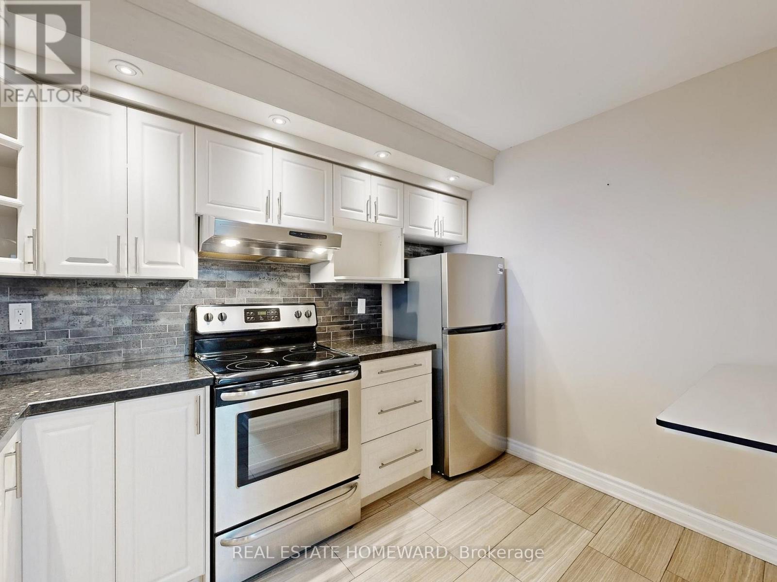 Stainless Steel Appliances and Double Sink - 1116 - 4725 Sheppard Avenue E, Toronto, ON - Indoor Photo Showing Kitchen With Stainless Steel Kitchen