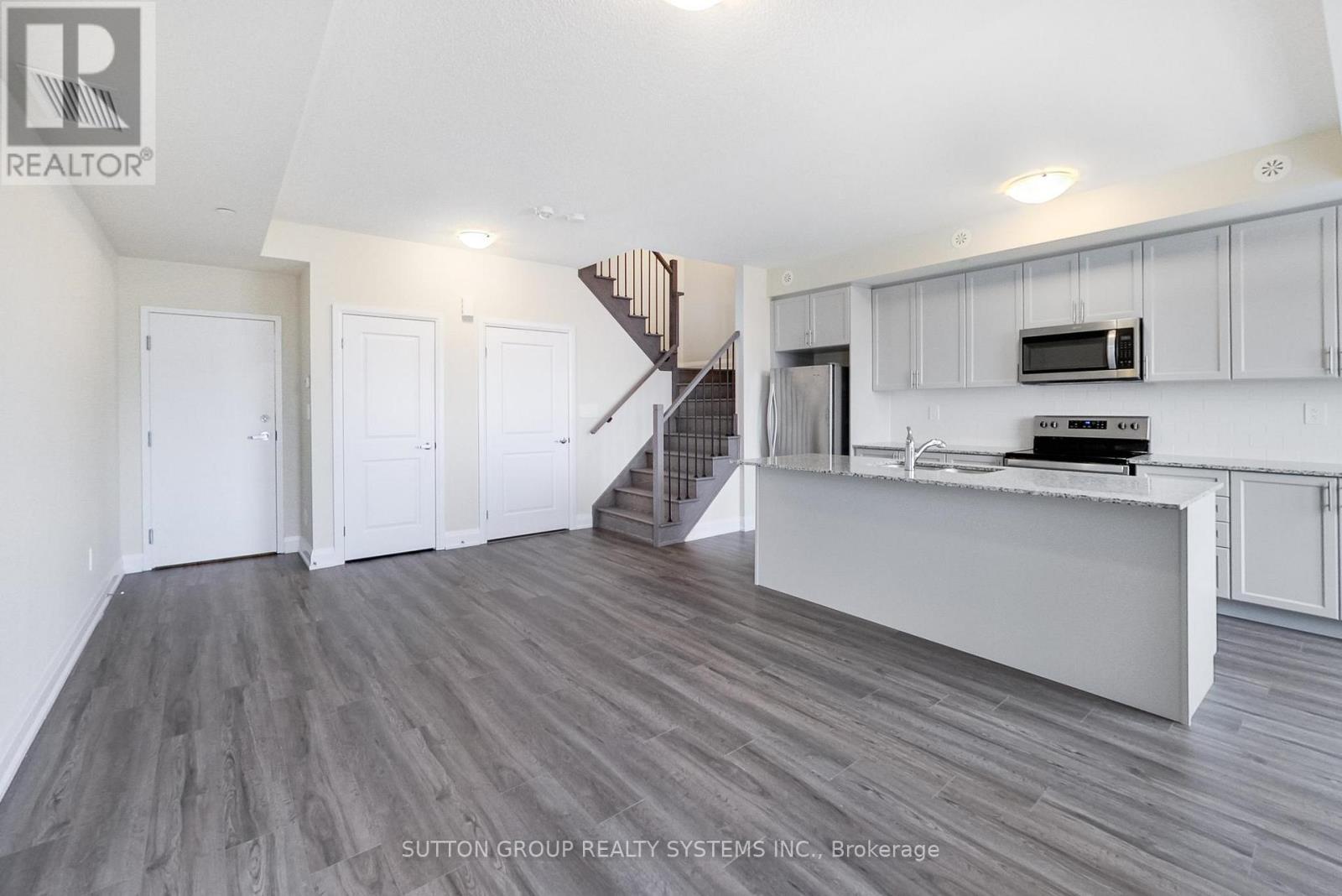 109 - 1573 Rose Way, Milton, ON - Indoor Photo Showing Kitchen With Double Sink