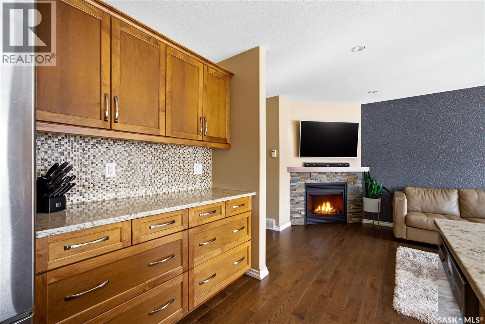 5221 Watson Way, Regina, SK - Indoor With Fireplace