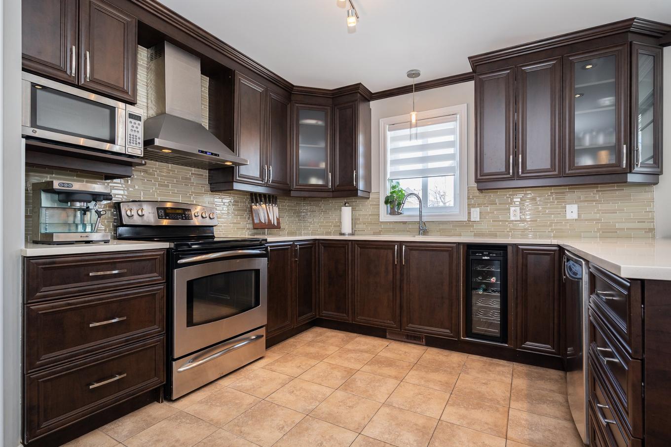 Kitchen - 4665 Rue Gaston-Chapleau, Laval (Chomedey), QC - Indoor Photo Showing Kitchen With Upgraded Kitchen