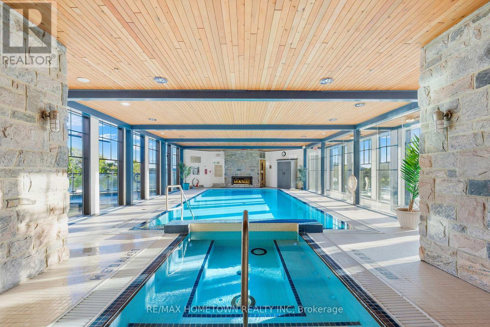 1205 - 15 St Andrew Street, Brockville, ON - Indoor Photo Showing Other Room With In Ground Pool