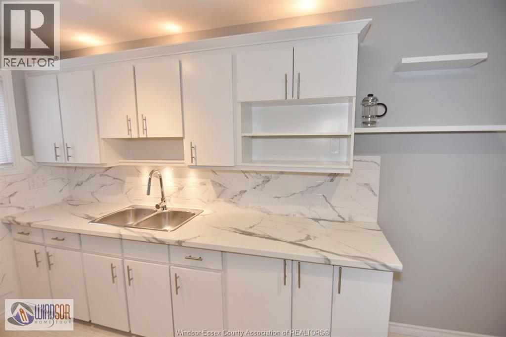 6278 Thornberry Crescent Unit# 501, Windsor, ON - Indoor Photo Showing Kitchen With Double Sink