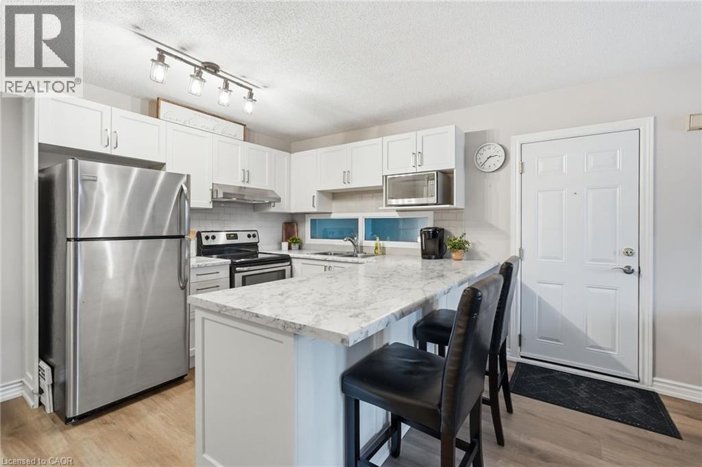 2040 Cleaver Avenue Unit# 315, Burlington, ON - Indoor Photo Showing Kitchen With Double Sink With Upgraded Kitchen