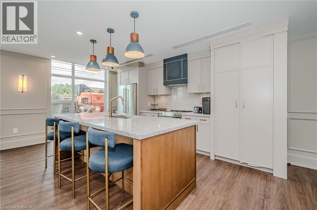 460 Dundas Street Unit# 1212, Waterdown, ON - Indoor Photo Showing Kitchen With Upgraded Kitchen