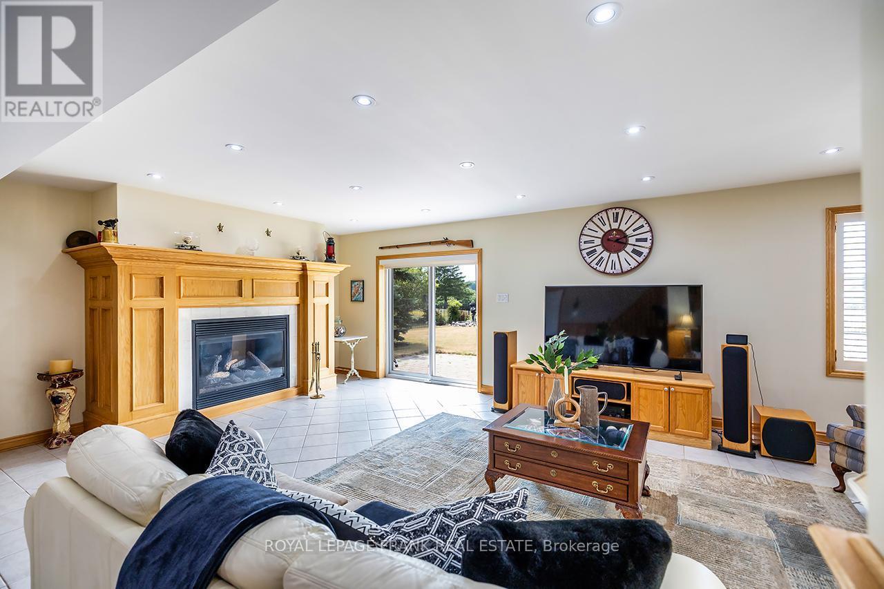 202 Southcrest Drive, Kawartha Lakes (Mariposa), ON - Indoor Photo Showing Living Room With Fireplace