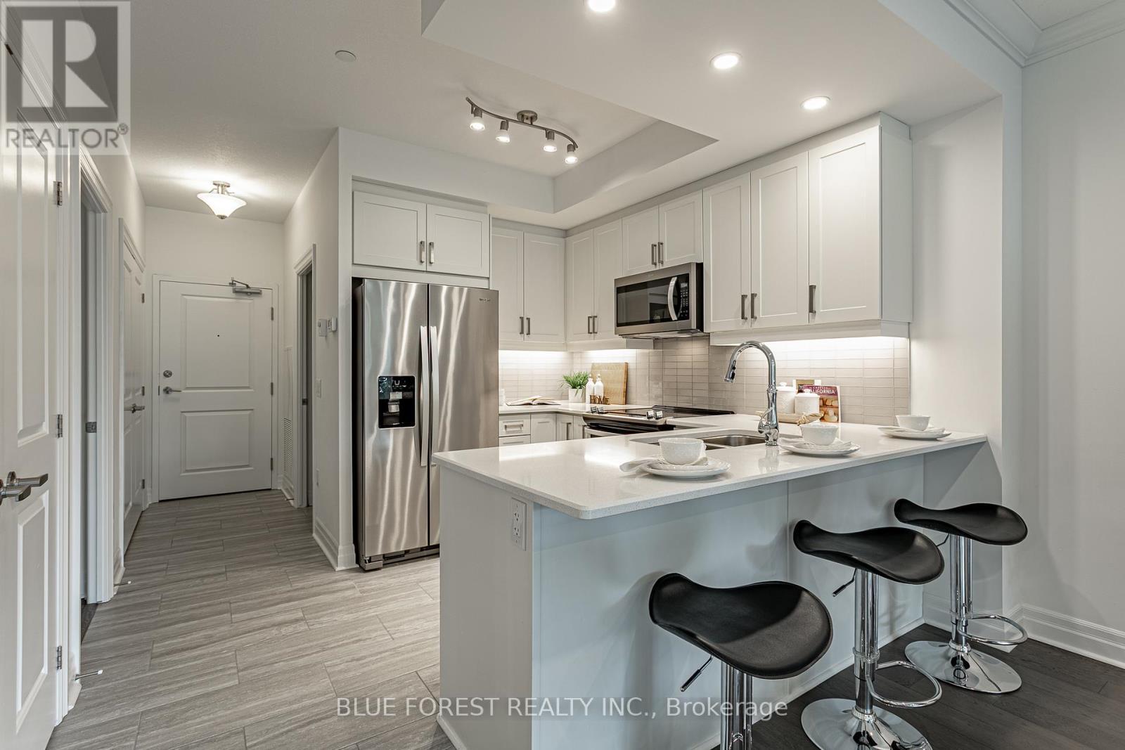 406 - 1200 Commissioners Road W, London South (South B), ON - Indoor Photo Showing Kitchen With Stainless Steel Kitchen With Upgraded Kitchen