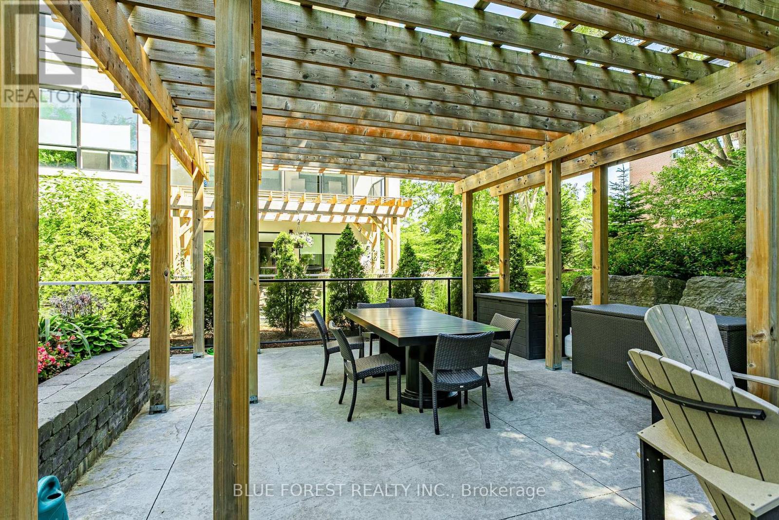 406 - 1200 Commissioners Road W, London South (South B), ON - With Deck Patio Veranda With Exterior