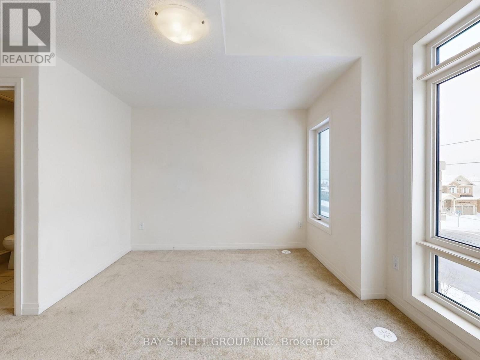 Primary Bedroom - 64 Emmas Way, Whitby, ON - Indoor Photo Showing Other Room