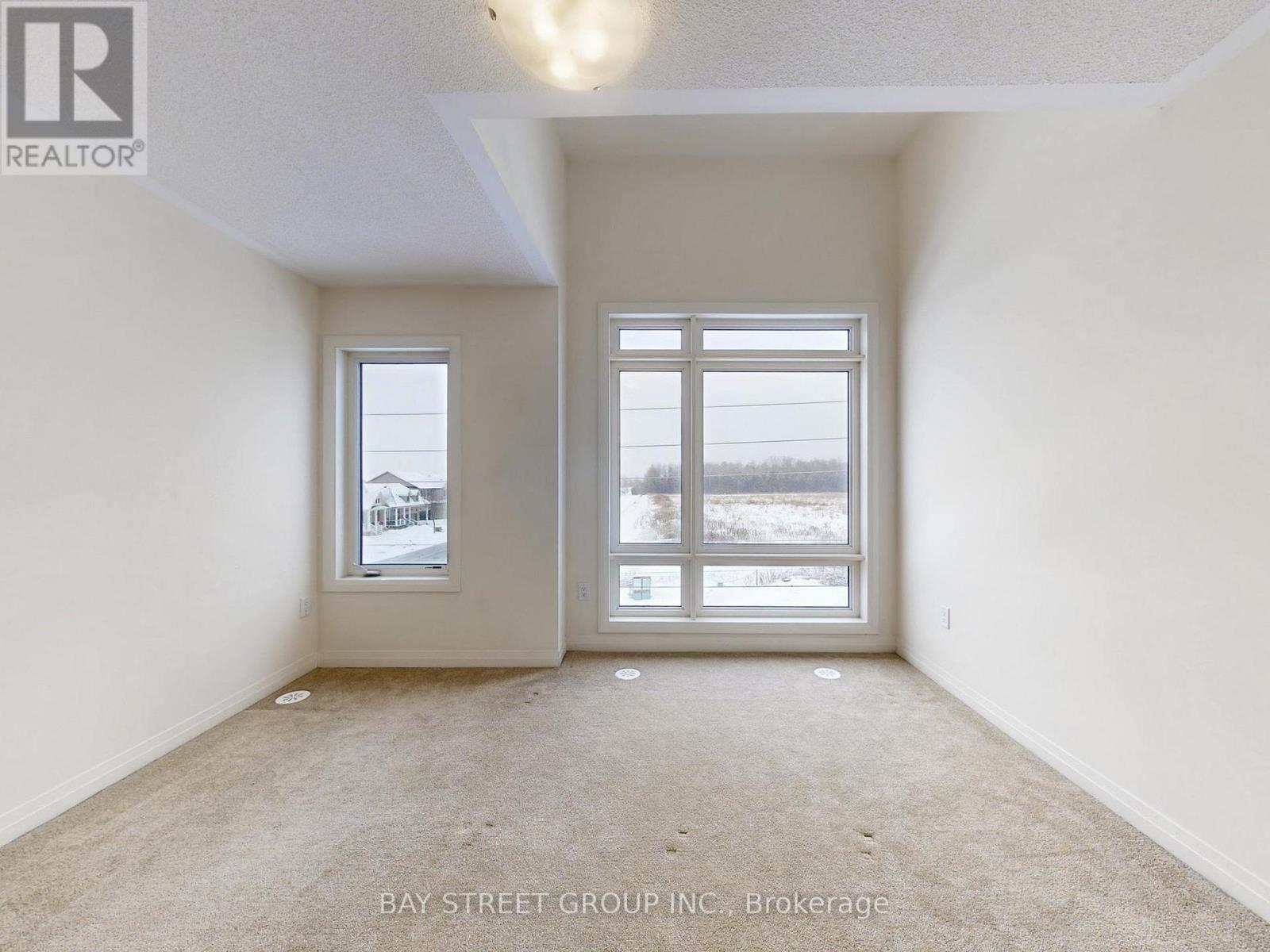 Primary Bedroom - 64 Emmas Way, Whitby, ON - Indoor Photo Showing Other Room
