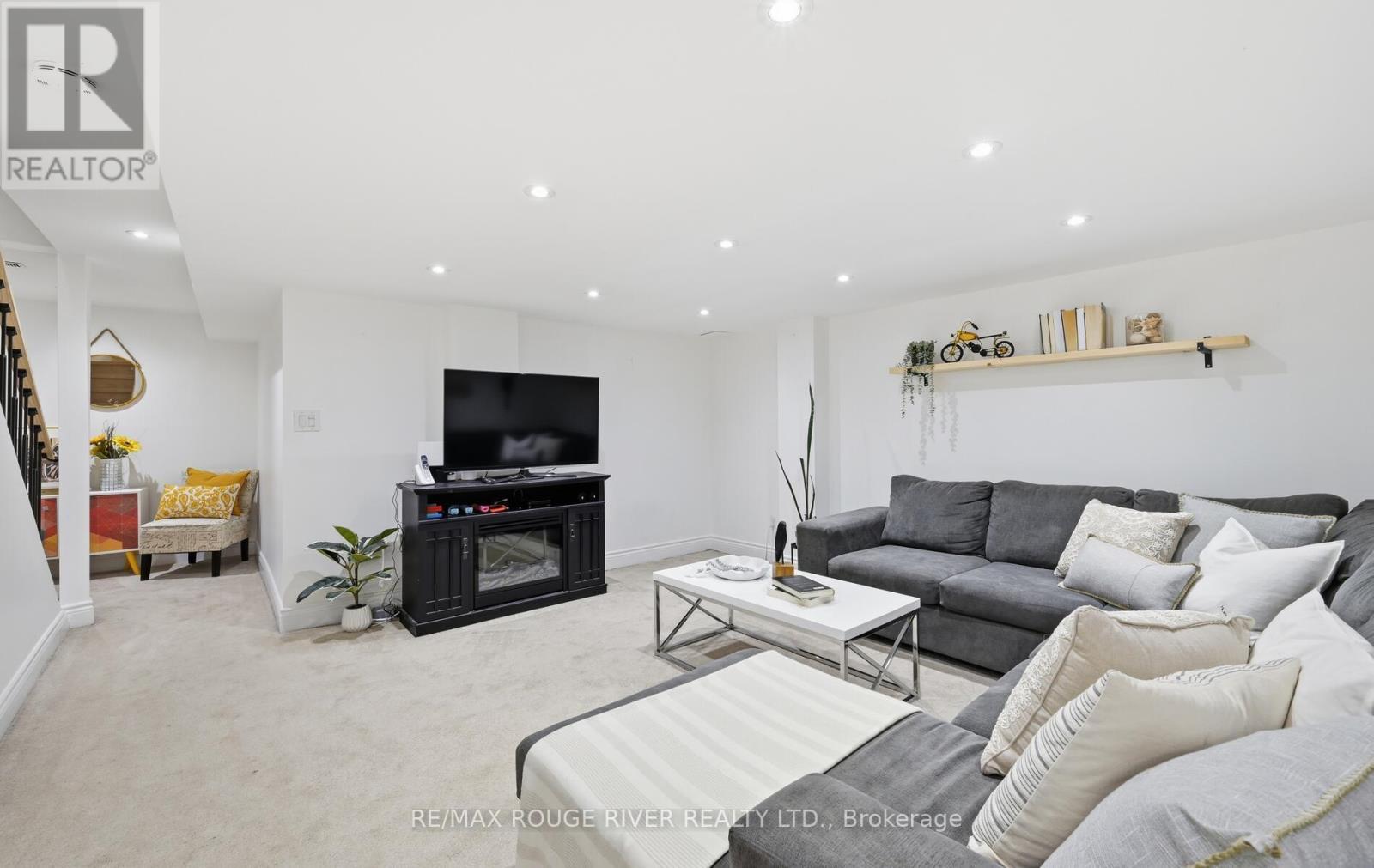 7 Hemans Court, Ajax, ON - Indoor Photo Showing Living Room With Fireplace