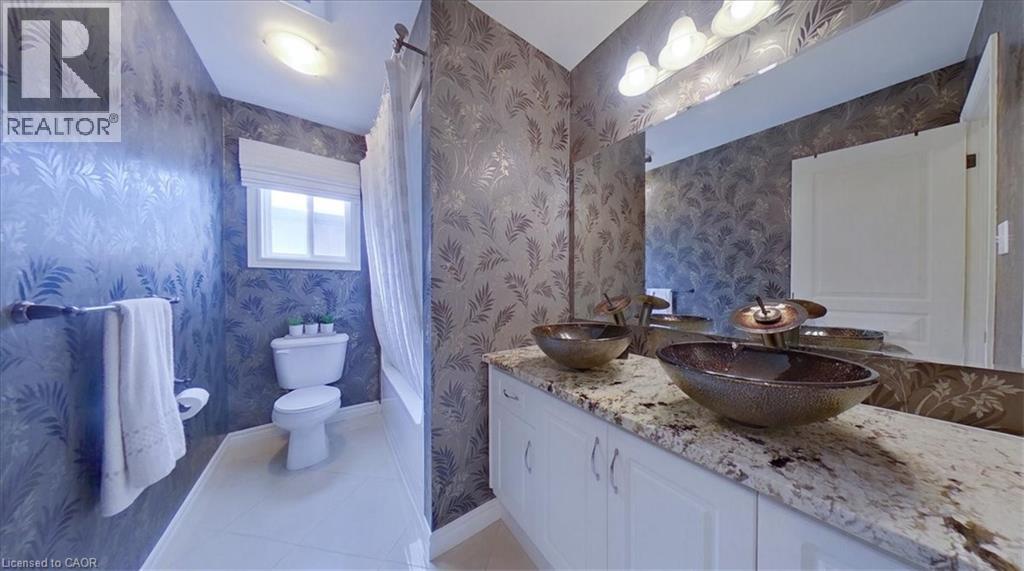 Updated 4pc hallway bath - 26 Helena Feasby Street, Kitchener, ON - Indoor Photo Showing Bathroom