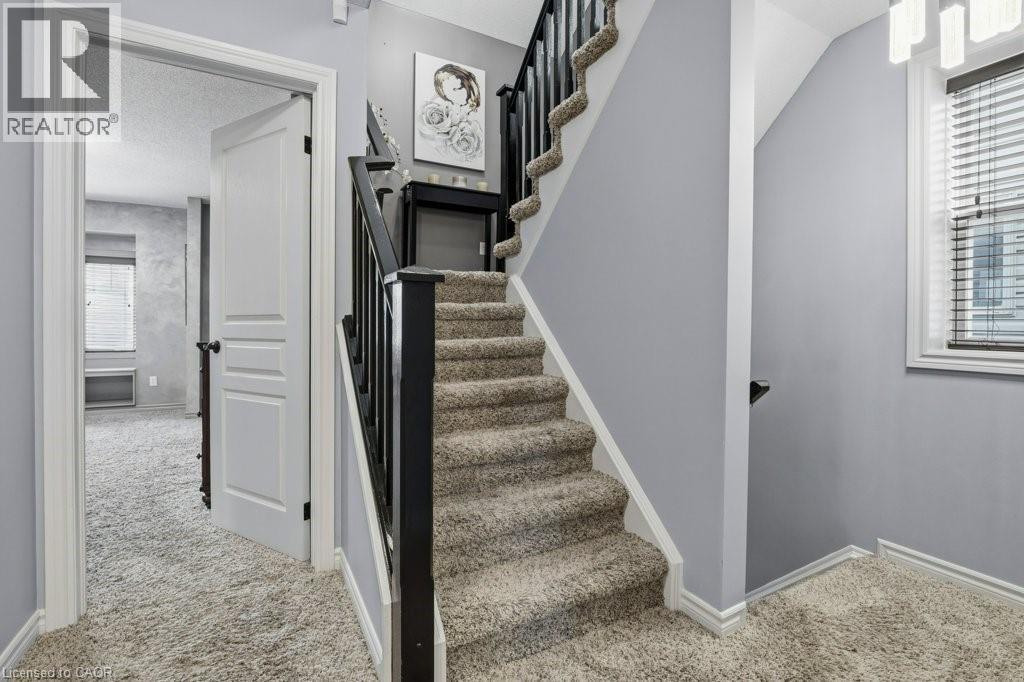 Stairs to the loft - 26 Helena Feasby Street, Kitchener, ON - Indoor Photo Showing Other Room