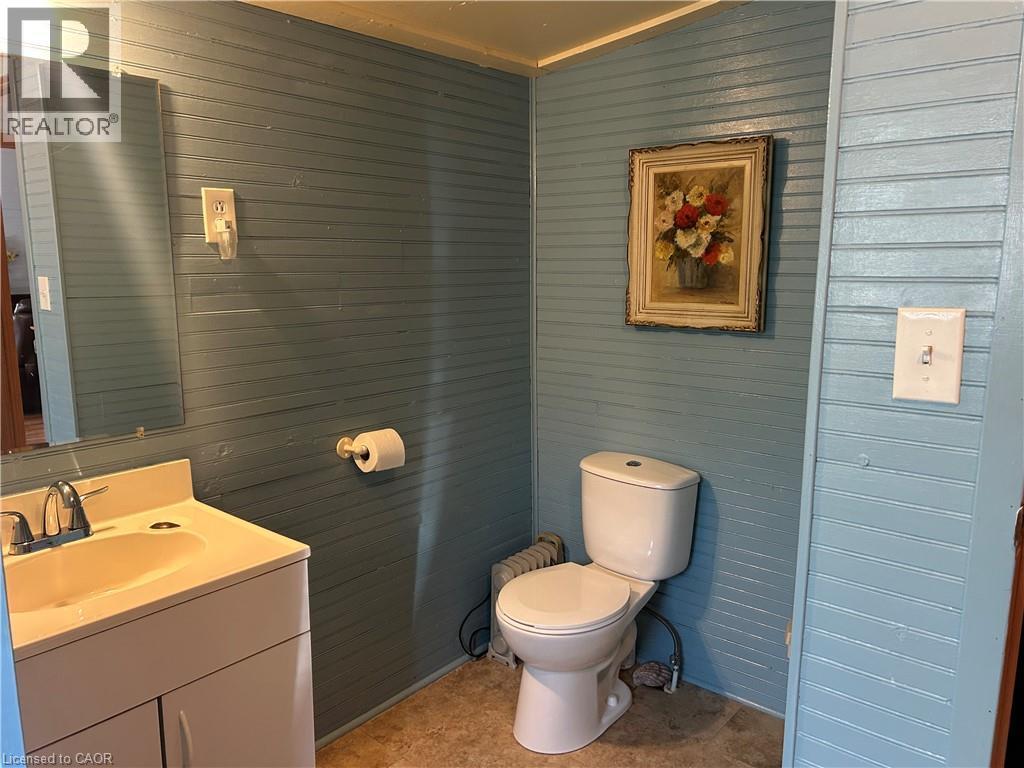 updated toilet 2023, spacious and airy houses electrical panel - 17 Maple Lane, Rainham, ON - Indoor Photo Showing Bathroom
