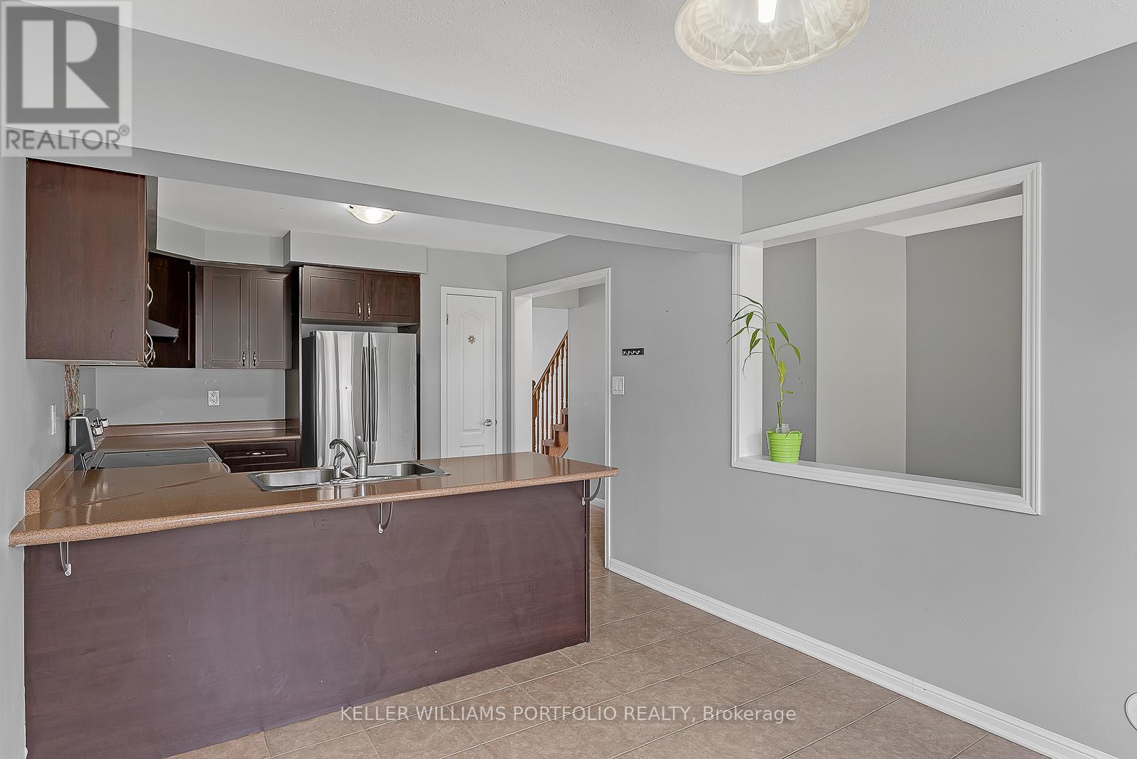 32 Affleck Road, Brampton, ON - Indoor Photo Showing Kitchen With Double Sink