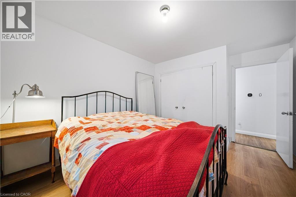 Bedroom featuring light wood-style flooring and a closet - 276 Lakeshore Road W, Oakville, ON - Indoor Photo Showing Bedroom