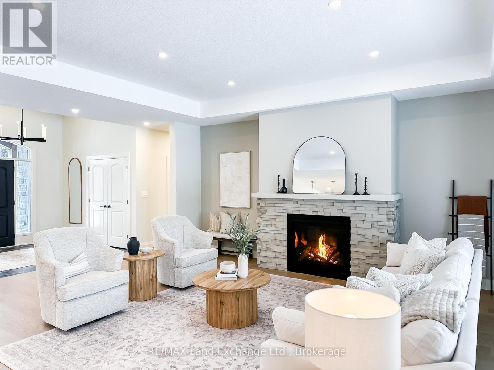 920 Bogdanovic Way, Huron-Kinloss, ON - Indoor Photo Showing Living Room With Fireplace