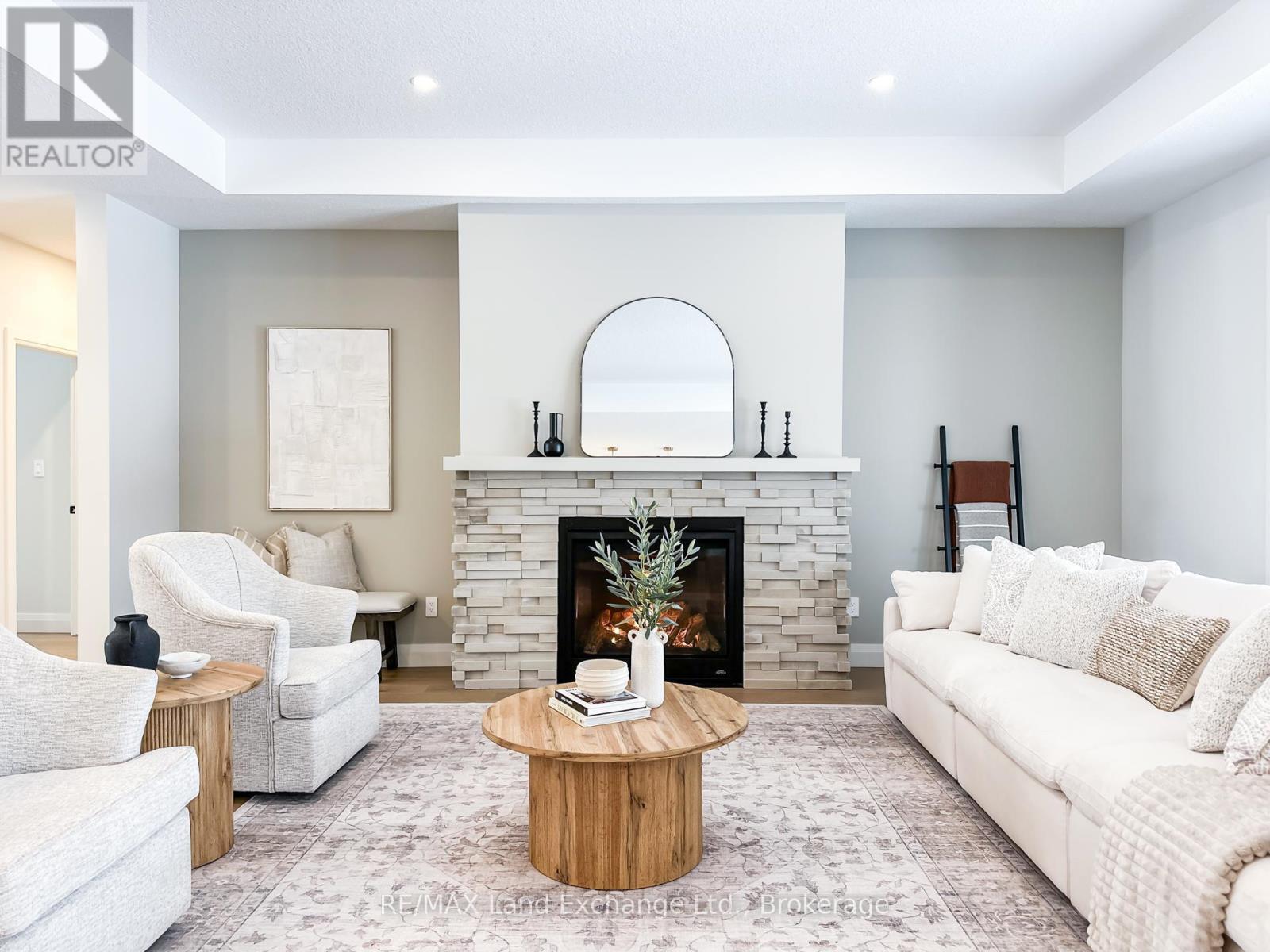 920 Bogdanovic Way, Huron-Kinloss, ON - Indoor Photo Showing Living Room With Fireplace