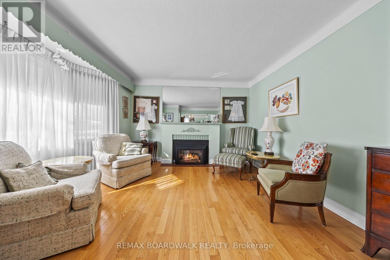 Living Room - 961 Kingsmere Avenue, Ottawa, ON - Indoor Photo Showing Living Room With Fireplace