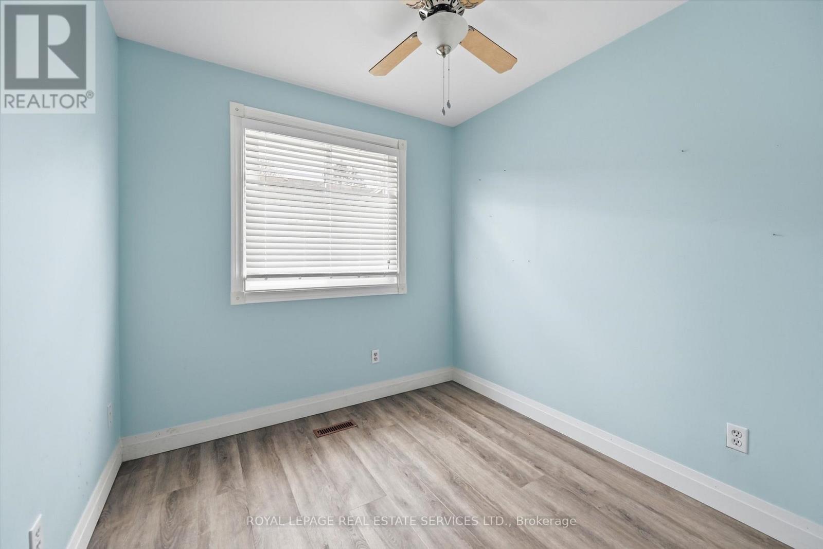 Third Bedroom Offers Brand New Laminate Flooring - 51 - 26 Moss Boulevard, Hamilton, ON - Indoor Photo Showing Other Room
