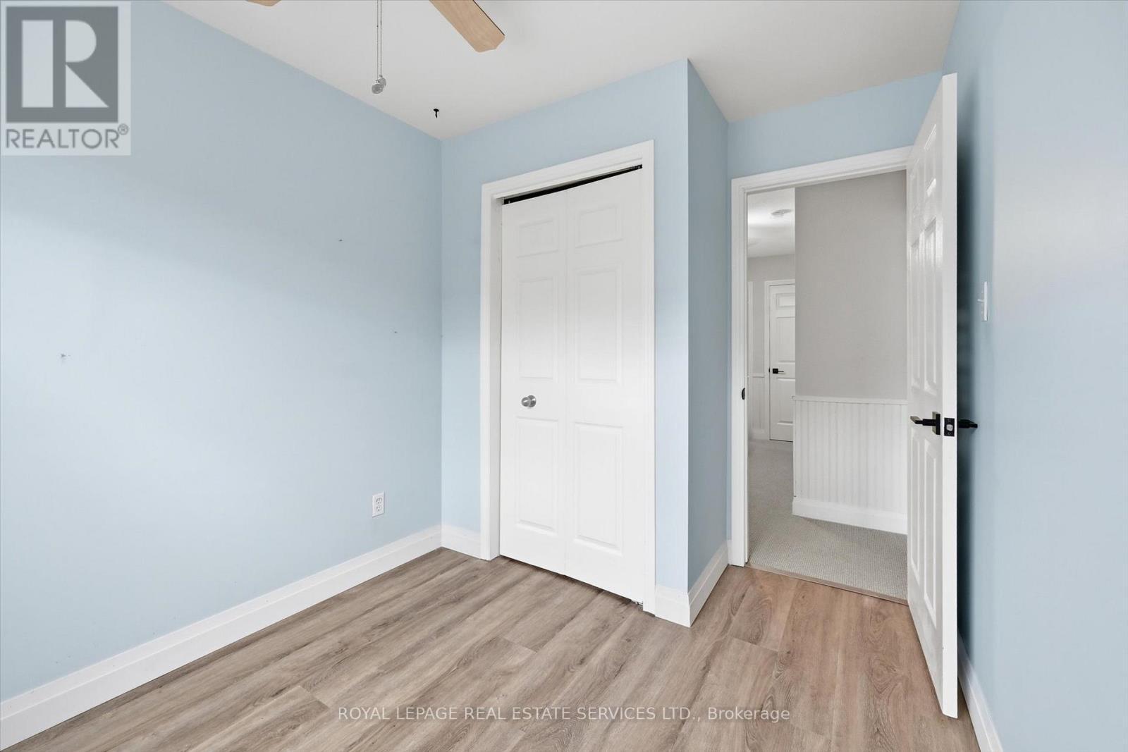Third Bedroom Offers Brand New Laminate Flooring - 51 - 26 Moss Boulevard, Hamilton, ON - Indoor Photo Showing Other Room