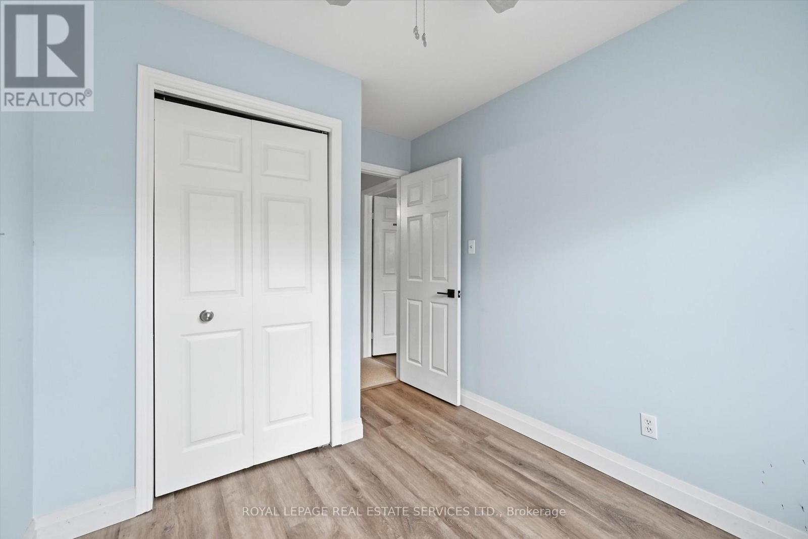 Third Bedroom Offers Brand New Laminate Flooring - 51 - 26 Moss Boulevard, Hamilton, ON - Indoor Photo Showing Other Room