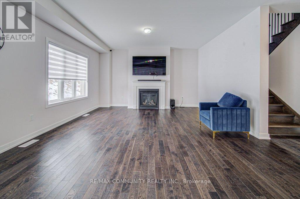 55 Tulip Crescent, Norfolk, ON - Indoor Photo Showing Living Room With Fireplace