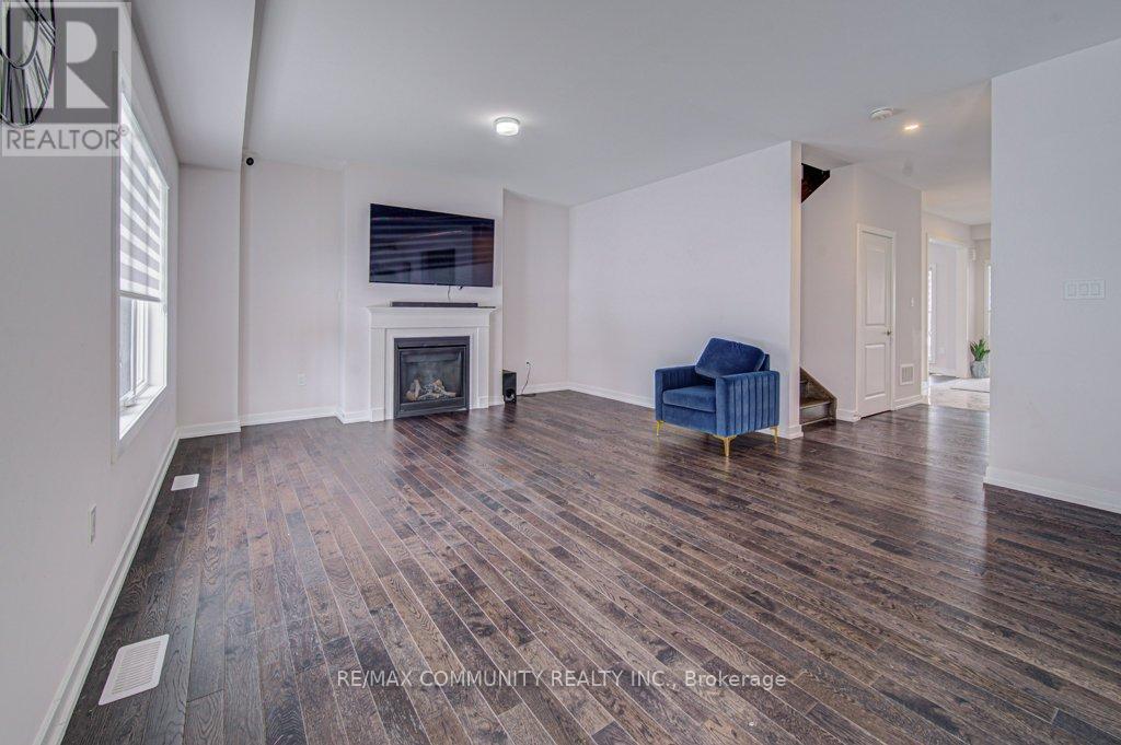 55 Tulip Crescent, Norfolk, ON - Indoor Photo Showing Other Room With Fireplace