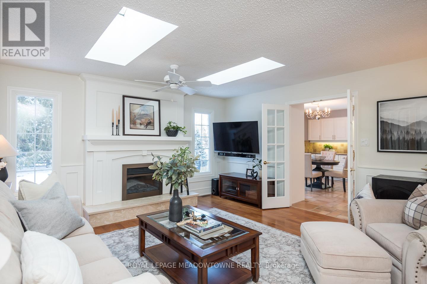 56 Acredale Drive, Hamilton, ON - Indoor Photo Showing Living Room With Fireplace