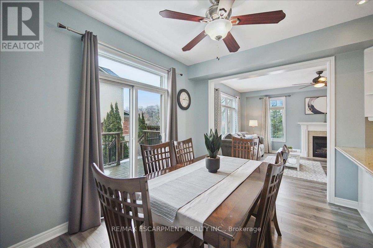 105 Oakhaven Place, Hamilton, ON - Indoor Photo Showing Dining Room With Fireplace