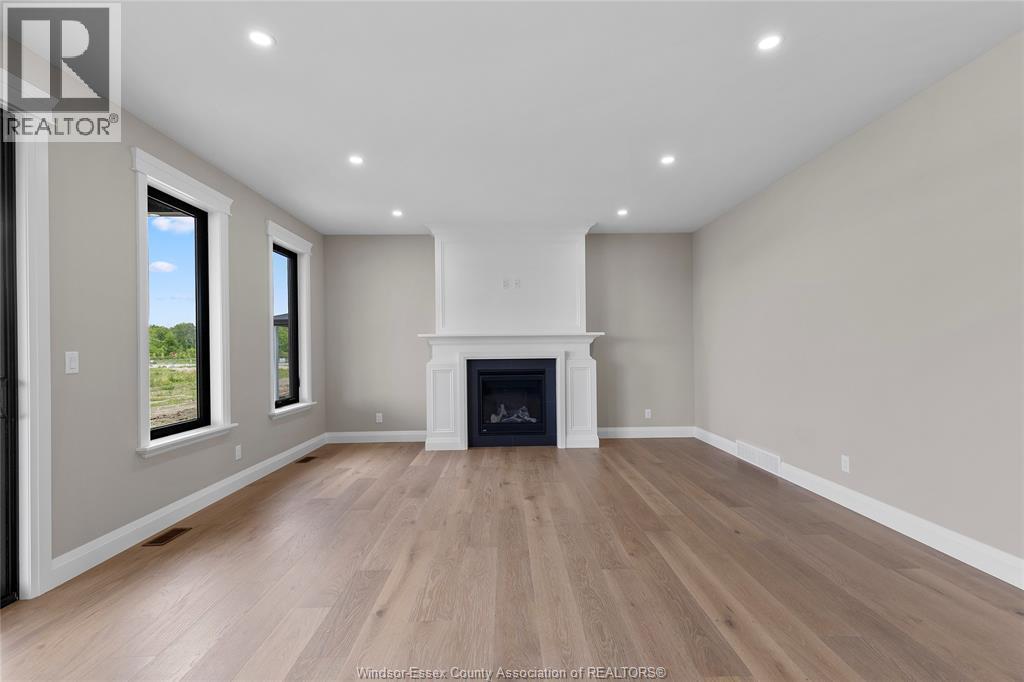 259 Joan Flood, Essex, ON - Indoor Photo Showing Living Room With Fireplace