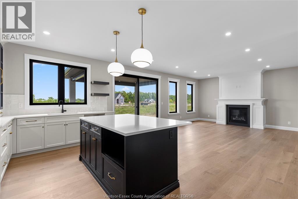 259 Joan Flood, Essex, ON - Indoor Photo Showing Kitchen With Fireplace