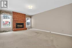 Main Level Family Room with Natural Gas Fireplace -
