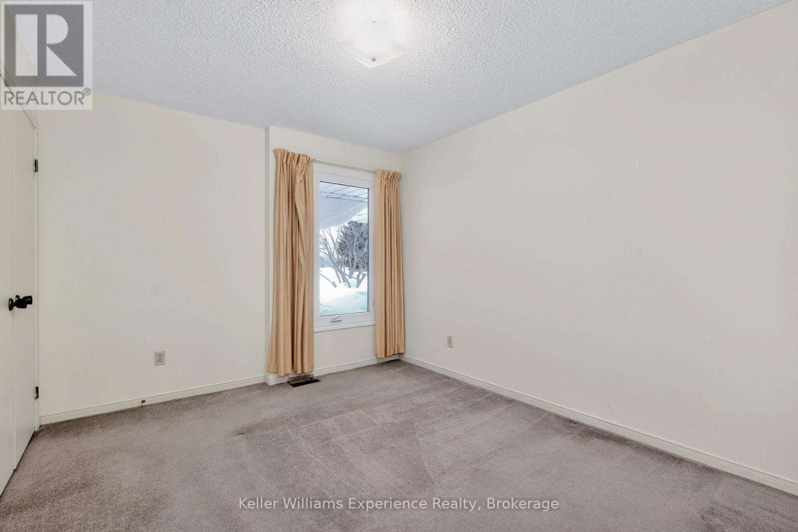 Main Floor Second Bedroom - 943 Playfair Road, Midland, ON - Indoor Photo Showing Other Room