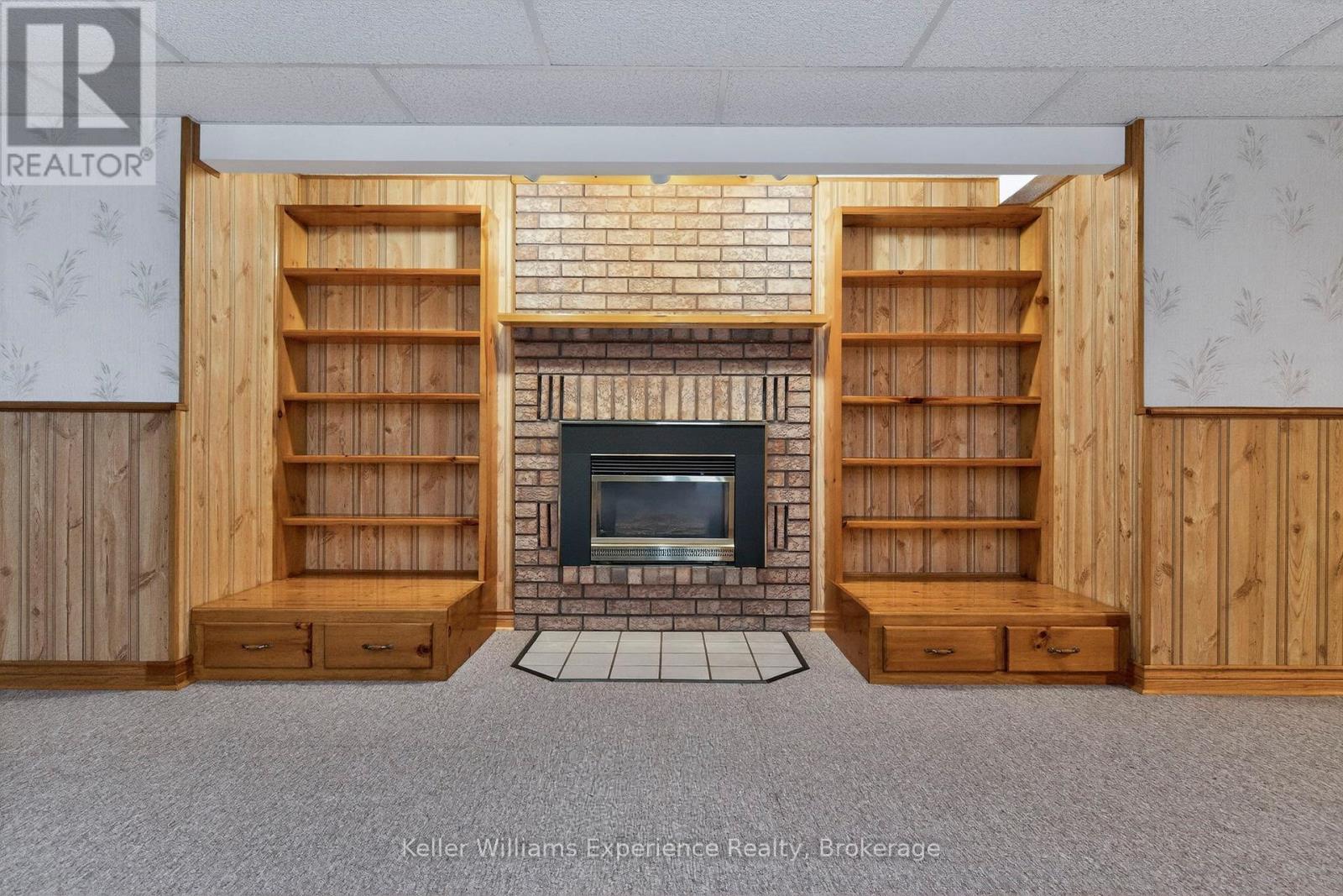 Basement Rec Room Natural Gas Fireplace - 943 Playfair Road, Midland, ON - Indoor With Fireplace