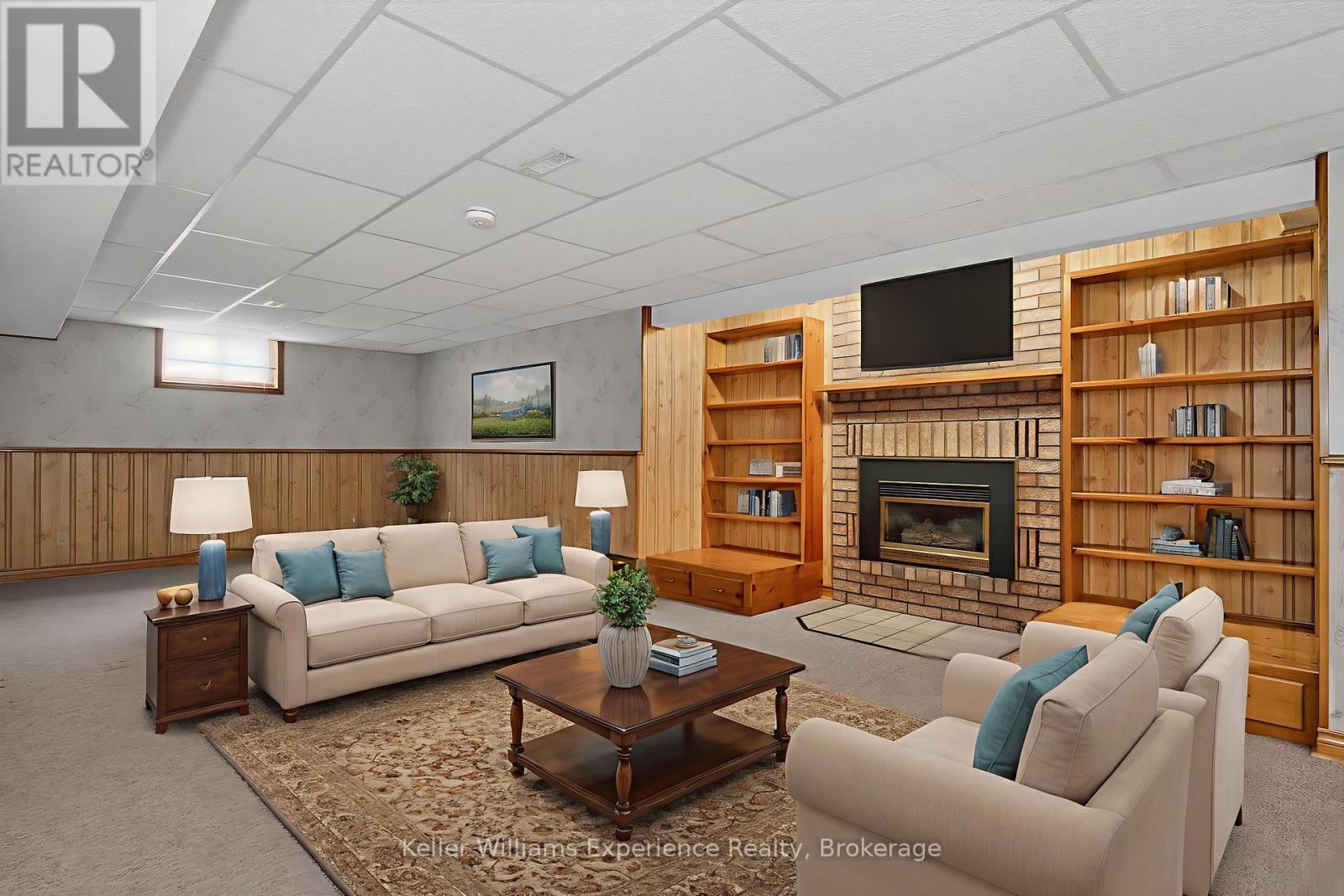 Digitally Staged - 943 Playfair Road, Midland, ON - Indoor With Fireplace