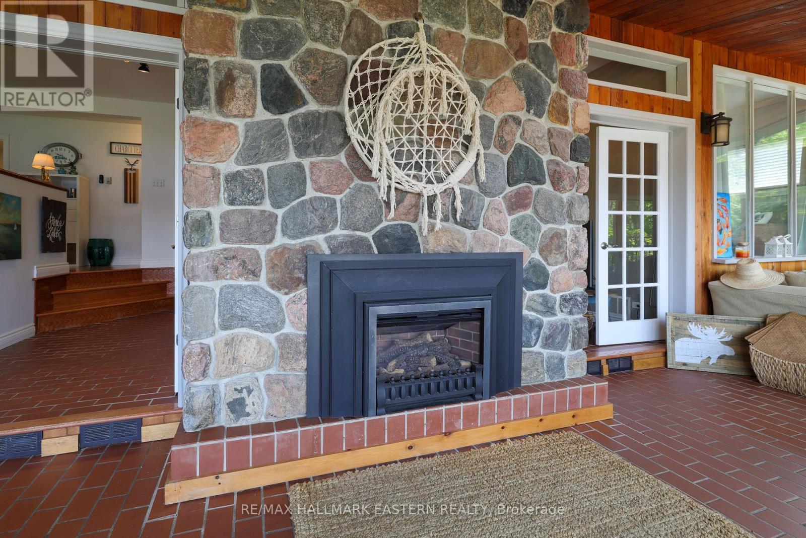 2310 Salmon Bay Road, Douro-Dummer, ON - Indoor Photo Showing Living Room With Fireplace