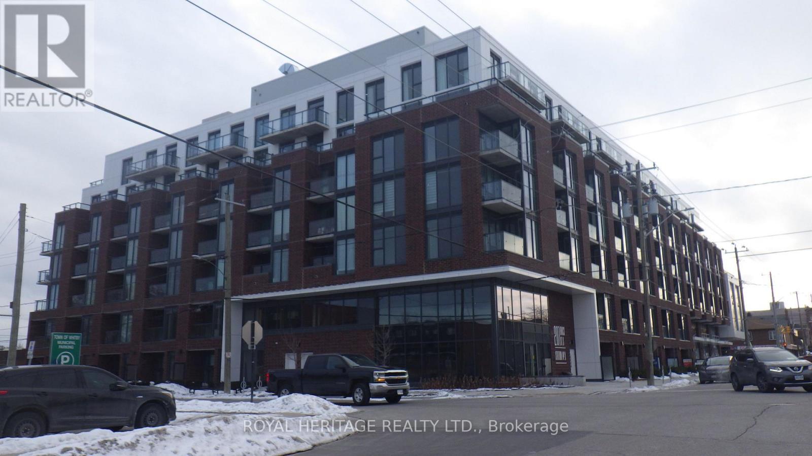 602 - 201 Brock Street S, Whitby, ON - Outdoor With Facade