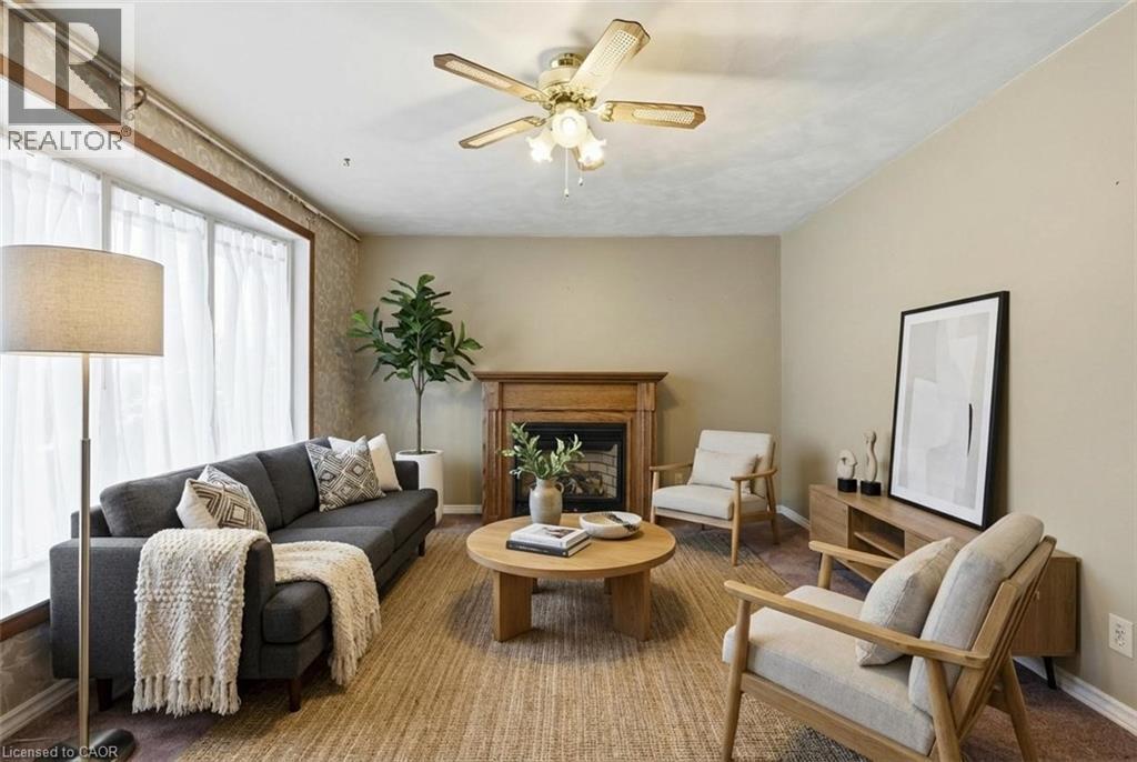 66 Geneva Crescent, Kitchener, ON - Indoor Photo Showing Living Room With Fireplace