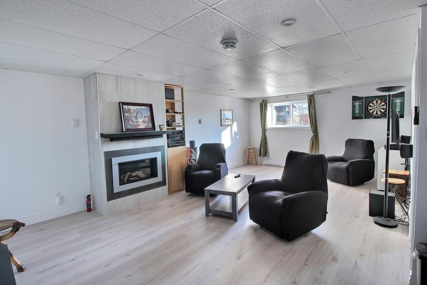 Salle à manger - 10208 Ch. De L'Éden, Rouyn-Noranda, QC - Indoor Photo Showing Living Room With Fireplace