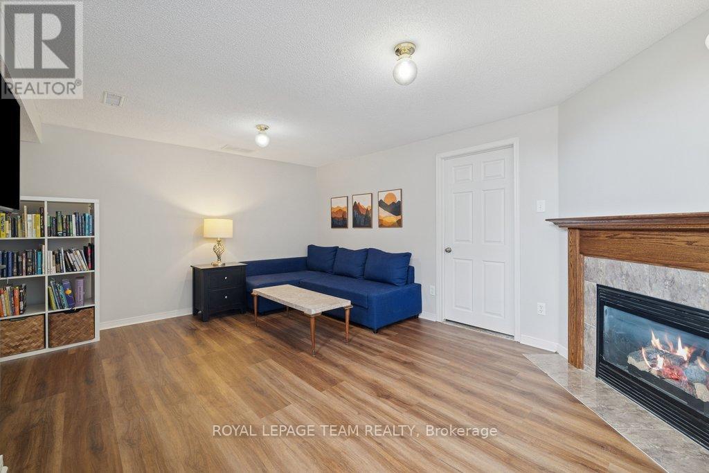 1493 Demeter Street, Ottawa, ON - Indoor Photo Showing Living Room With Fireplace